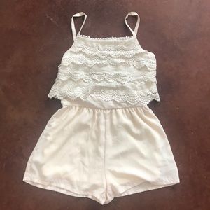 Cream romper with zip up back